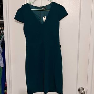 Green knee length fitted dress